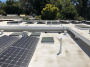 new roof with solar panels and skylights