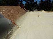 flat spray foam roofing